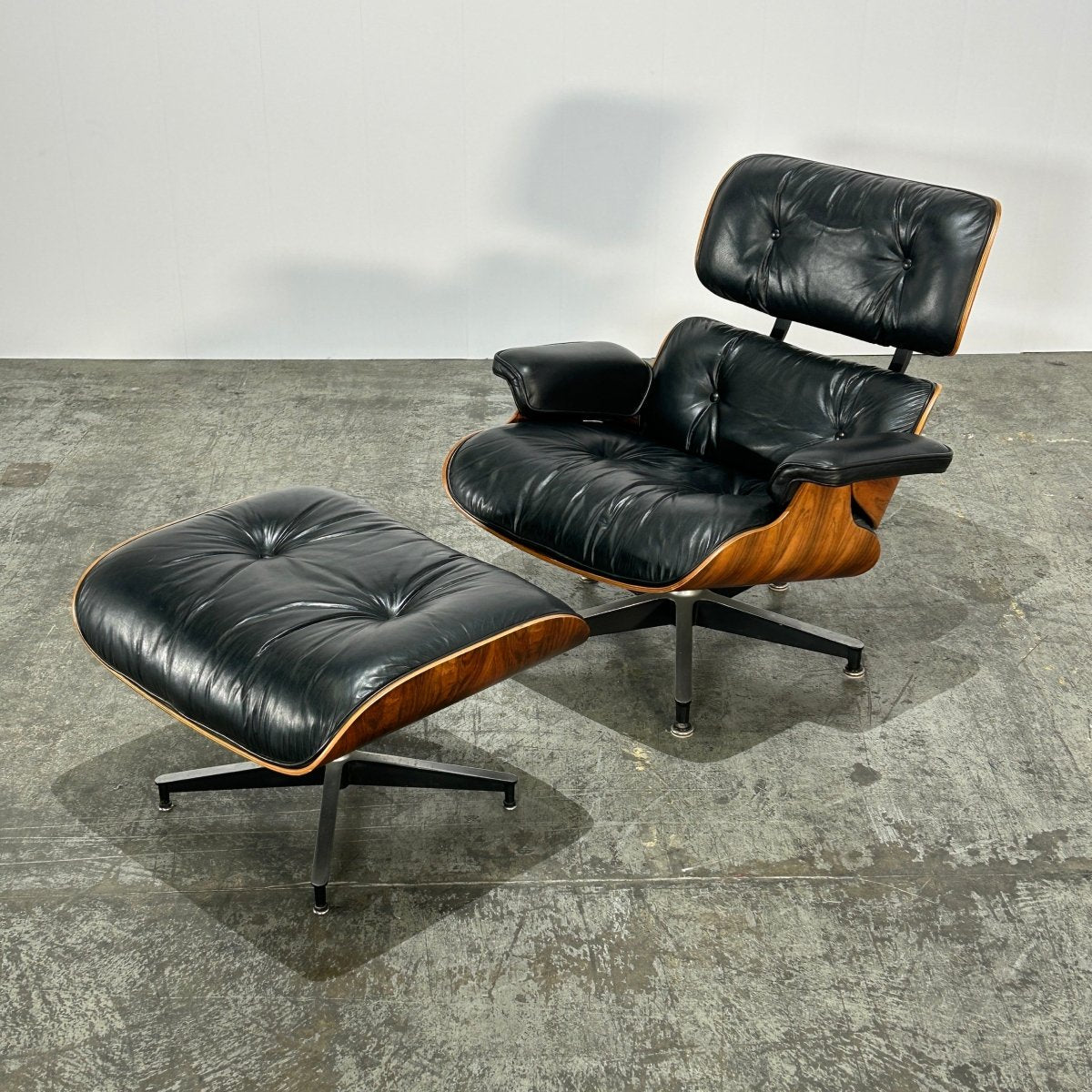 1970's Rosewood Eames Chair & Ottoman by Herman Miller @ REHAUS