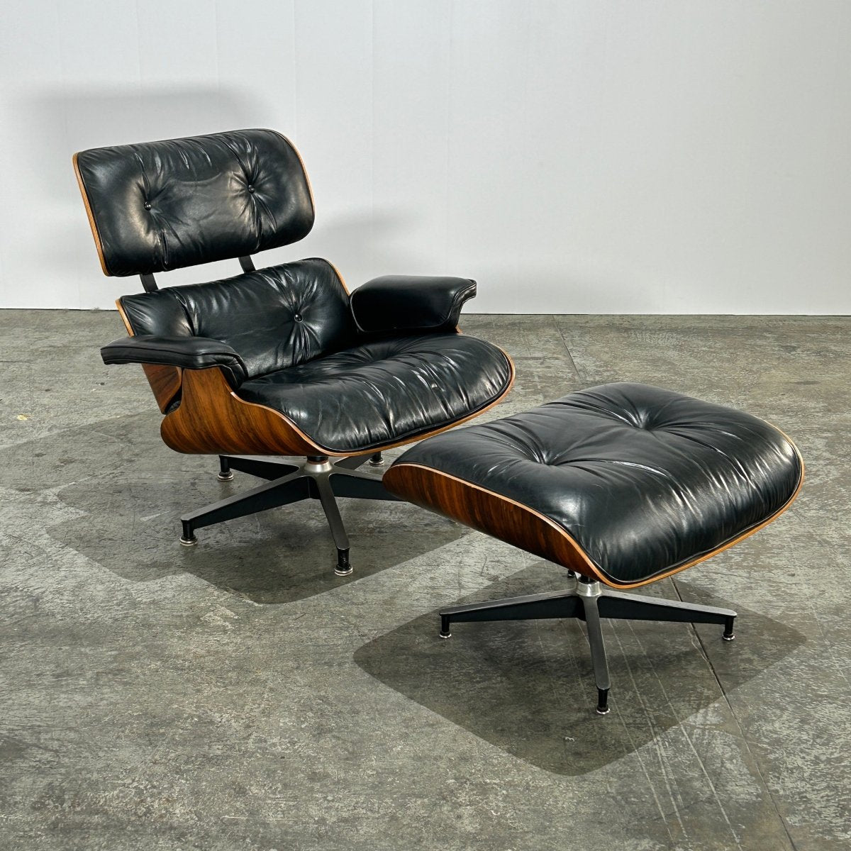 1970's Rosewood Eames Chair & Ottoman by Herman Miller @ REHAUS