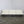 5 Canapé, Appartement Le Corbusier Three Seater in White Leather with Black Frame @ REHAUS