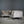 Bespoke Concrete Armchair in Pewter Grey Napa Leather with Soft Chesterfield Detailing - REHAUS - Bespoke