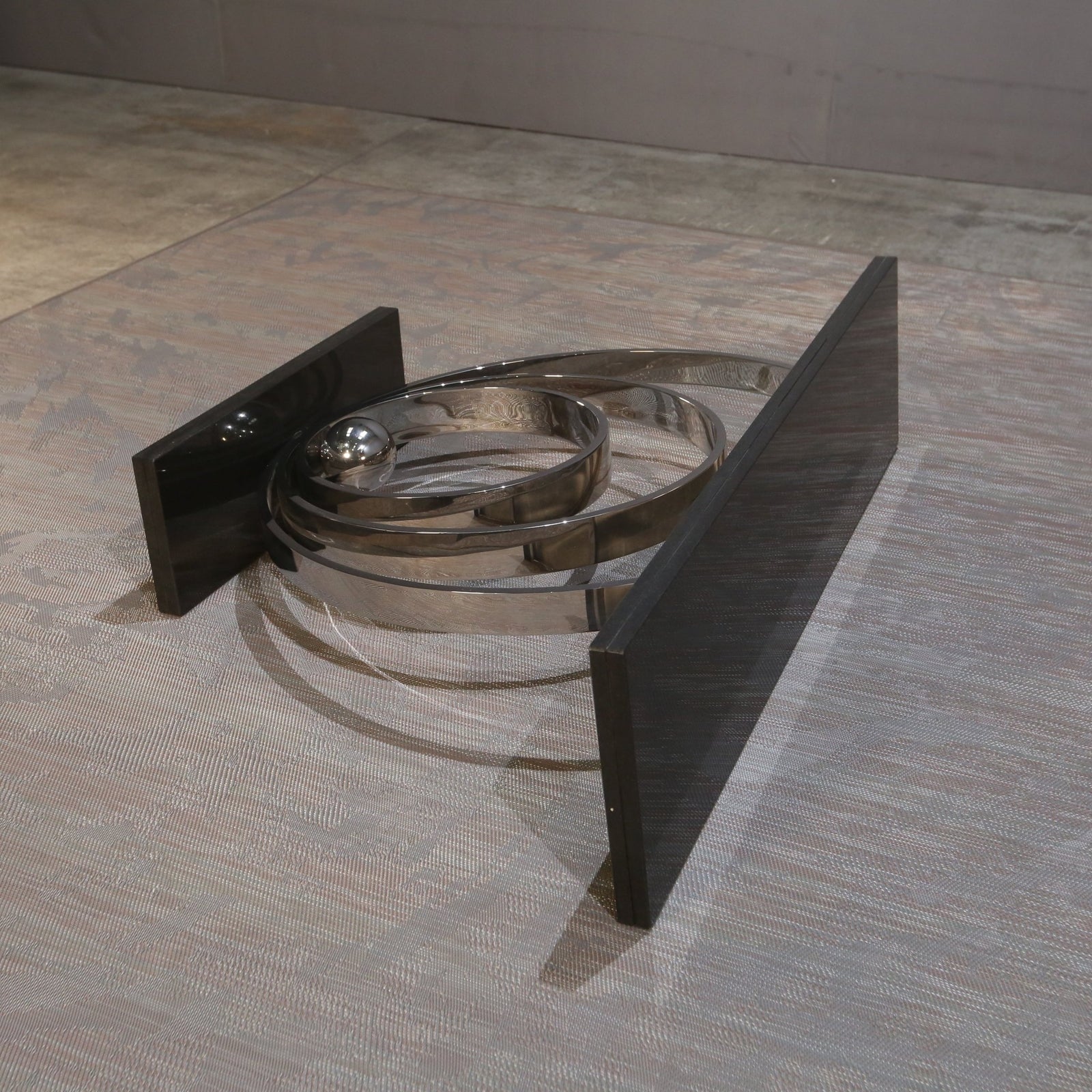 Decorus Ammonite Console Table in Polished Stainless Steel with Black Granite Top @ REHAUS