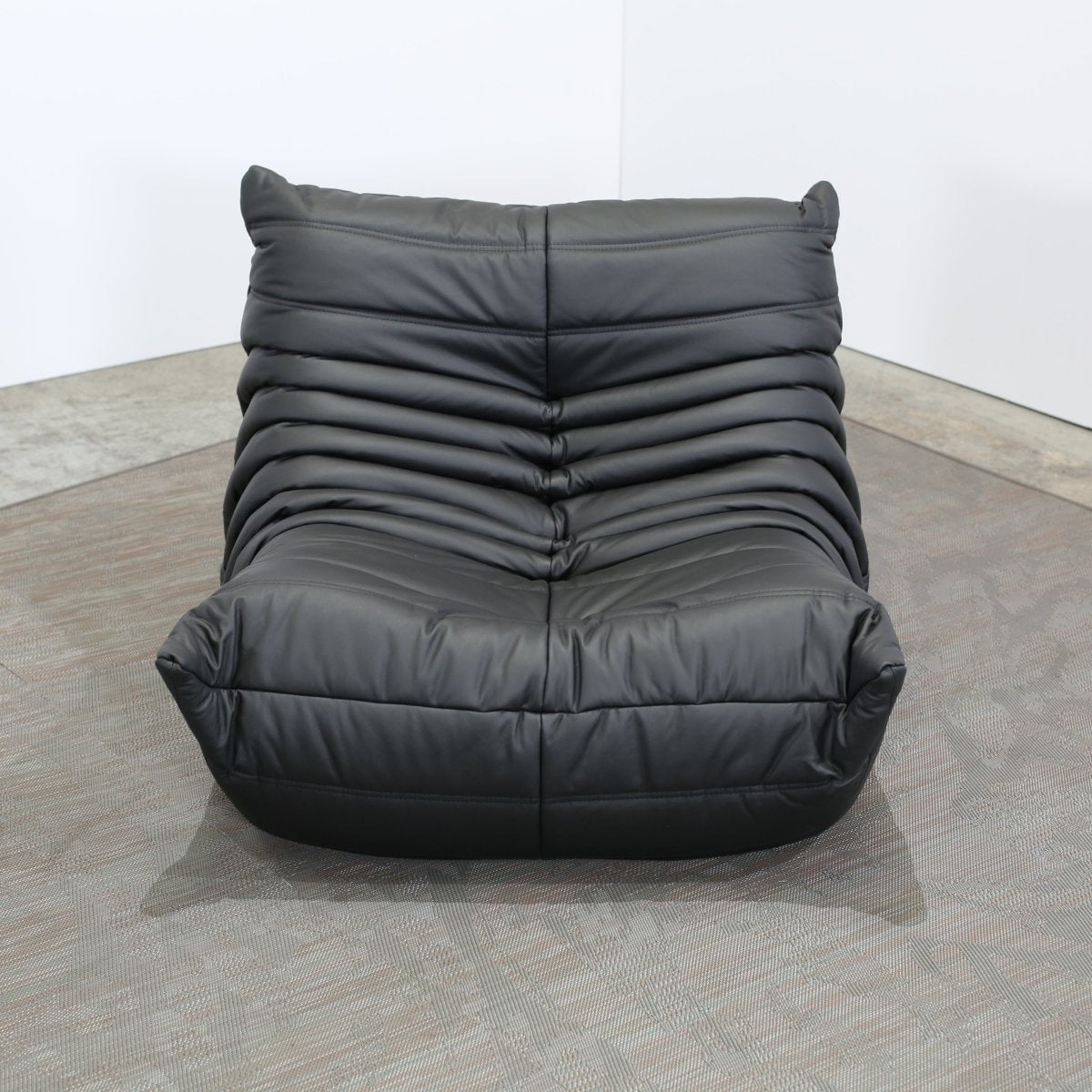 Ligne Roset Black Leather Togo Armchair and Footstool by Michel Ducaroy, Set of Two @ REHAUS
