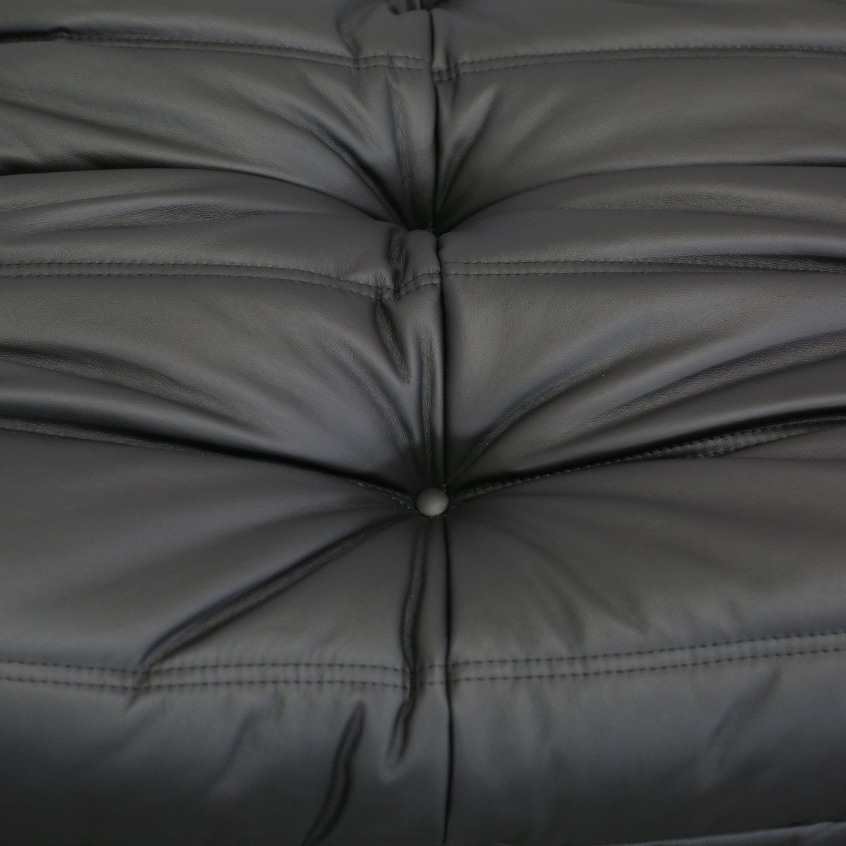 Ligne Roset Black Leather Togo Armchair and Footstool by Michel Ducaroy, Set of Two @ REHAUS
