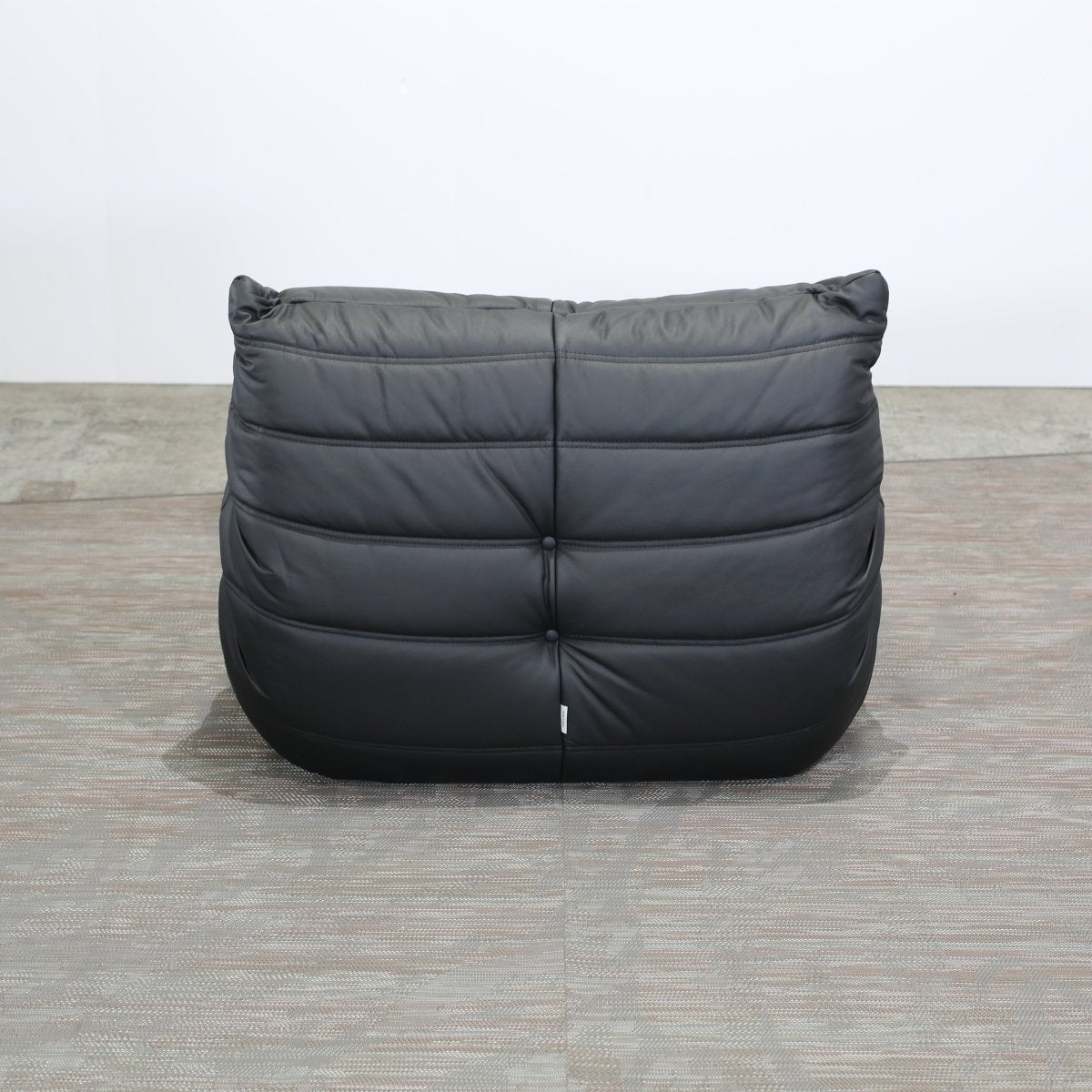 Ligne Roset Black Leather Togo Armchair and Footstool by Michel Ducaroy, Set of Two @ REHAUS