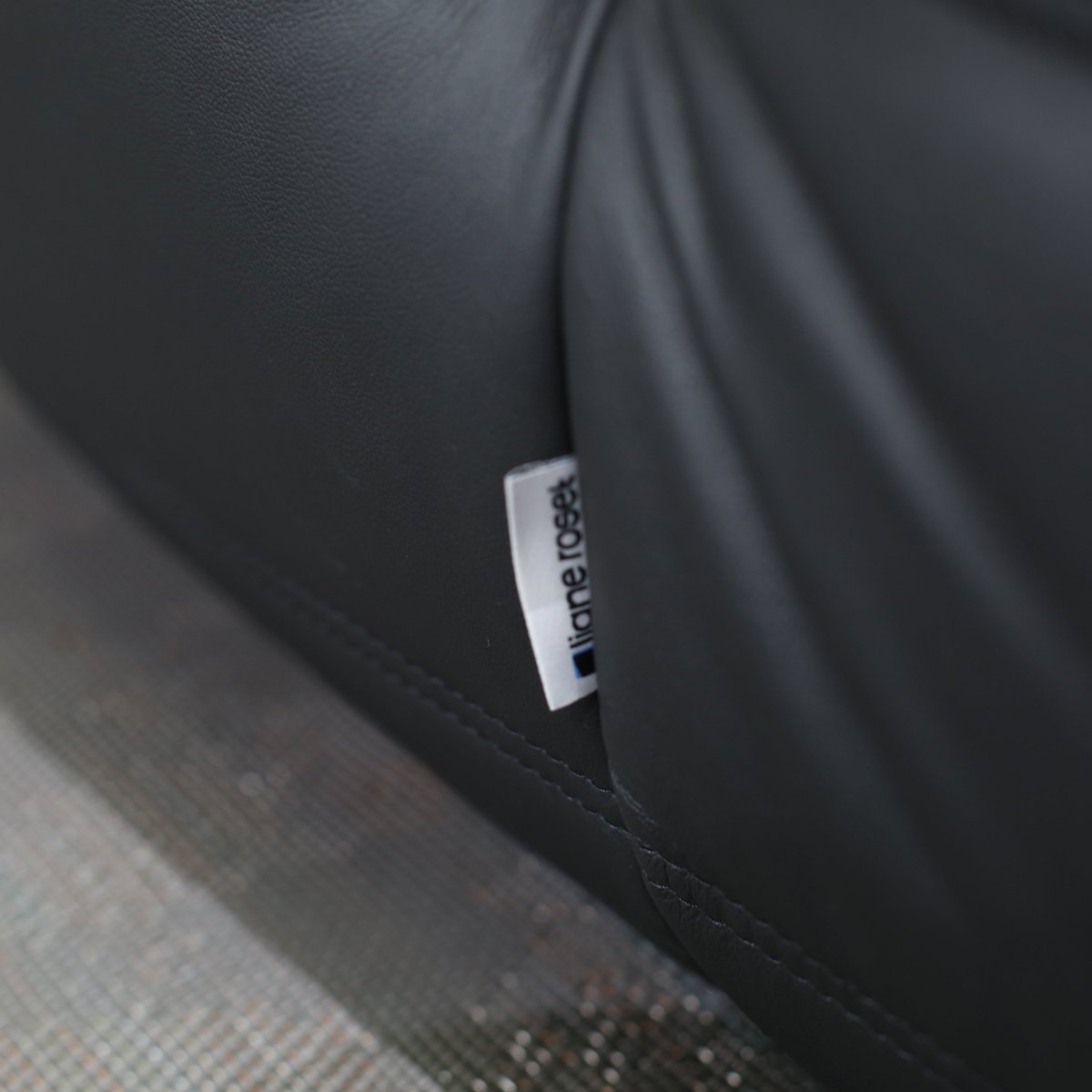 Ligne Roset Black Leather Togo Armchair and Footstool by Michel Ducaroy, Set of Two @ REHAUS