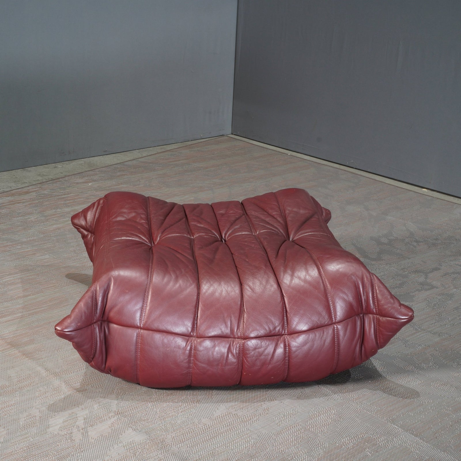 Ligne Roset Burgundy Leather Togo Footstool by Michel Ducaroy @ REHAUS