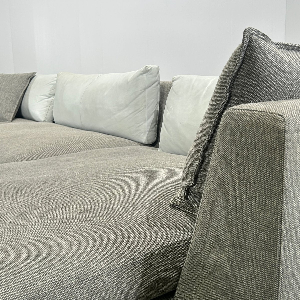 Ligne Roset Corner Grey Sofa with Leather Cushions @ REHAUS