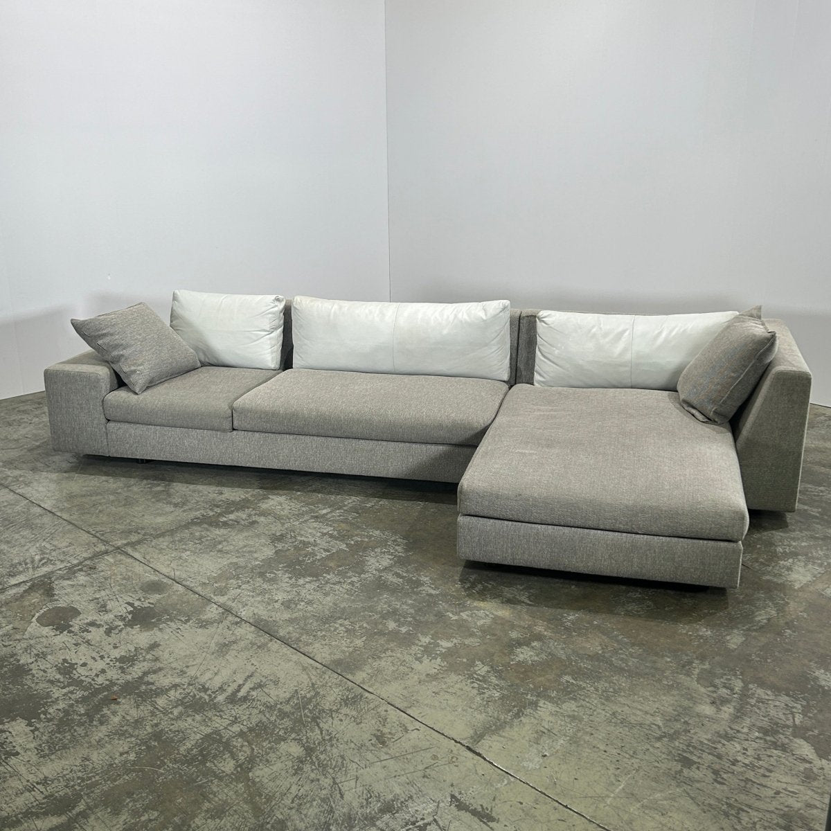 Ligne Roset Corner Grey Sofa with Leather Cushions @ REHAUS