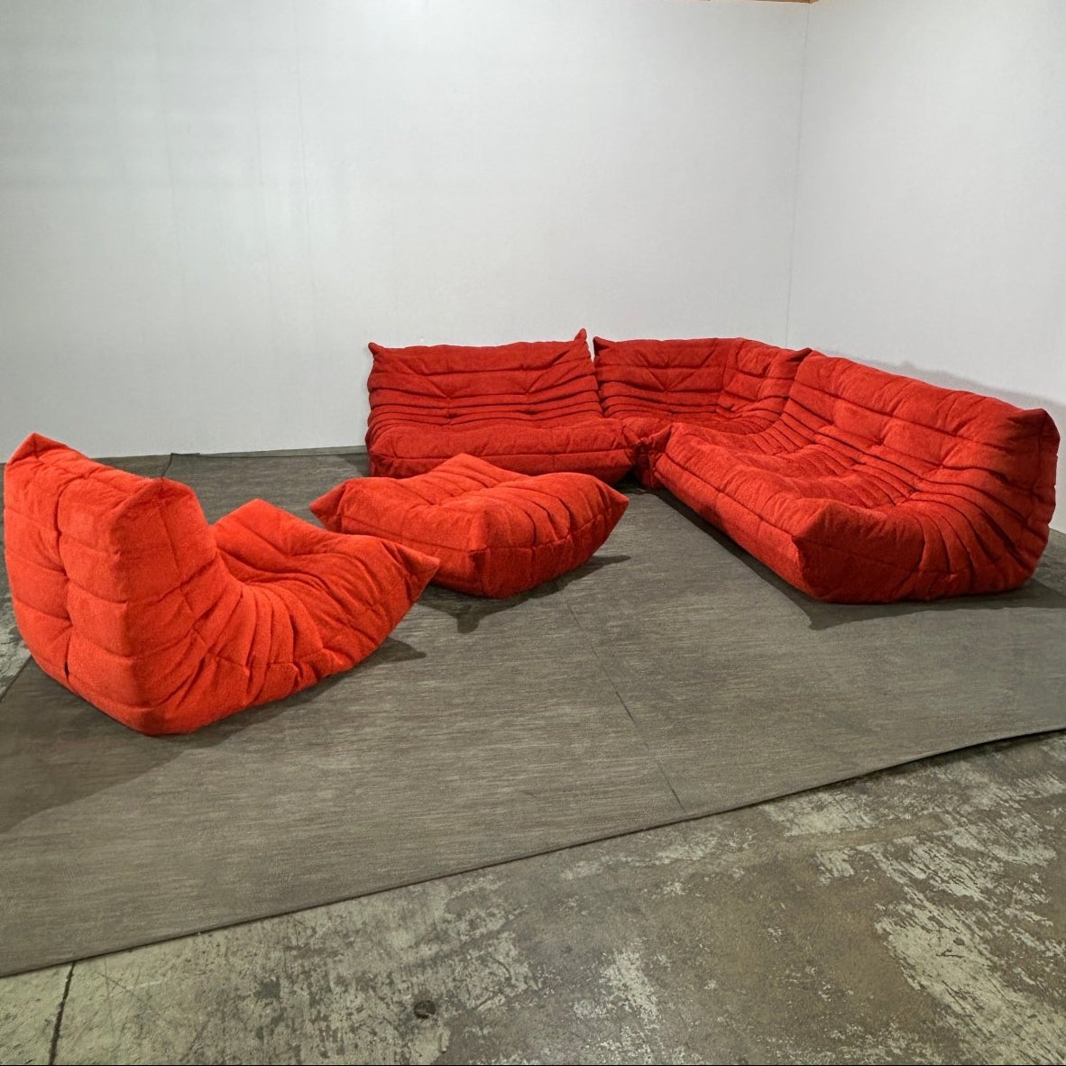 Ligne Roset Orange Modular Togo Sofa and Footstool by Michel Ducaroy, Set of Five @ REHAUS