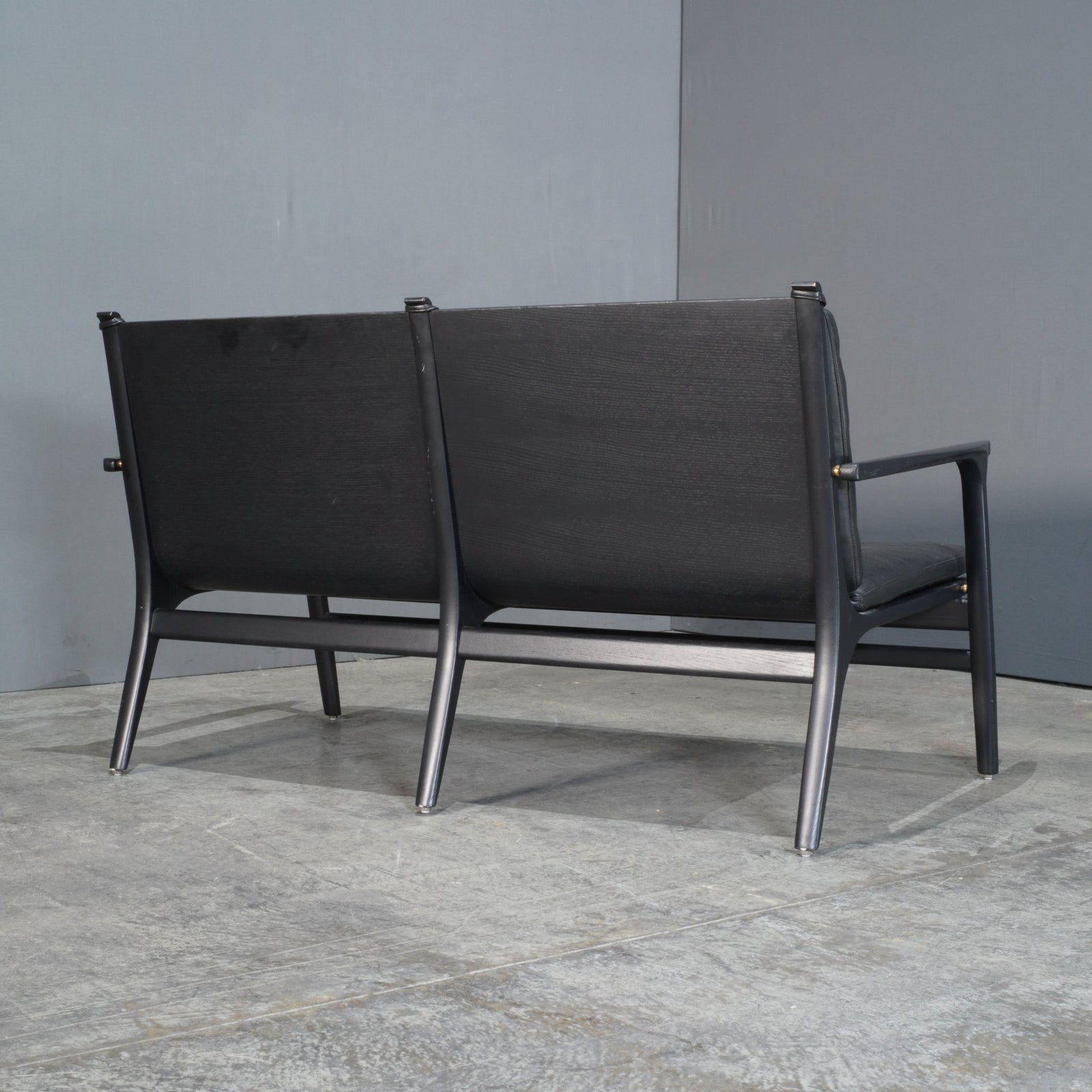 Stellar Works Rén Black Leather and Oak Two Seater Sofa by Space Copenhagen @ REHAUS